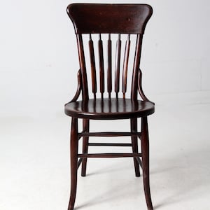 antique cattail back chair by Koenig Furniture Co.