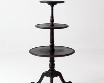 antique Victorian tiered stand with claw feet