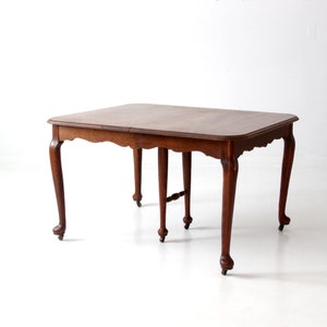 antique Queen Anne style dining table