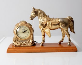 mid-century United self-starting horse clock