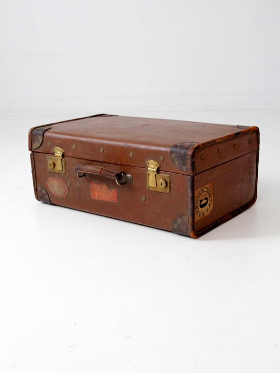 vintage suitcase with travel stickers