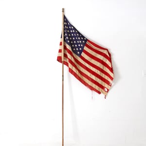 vintage 1960s American flag on pole