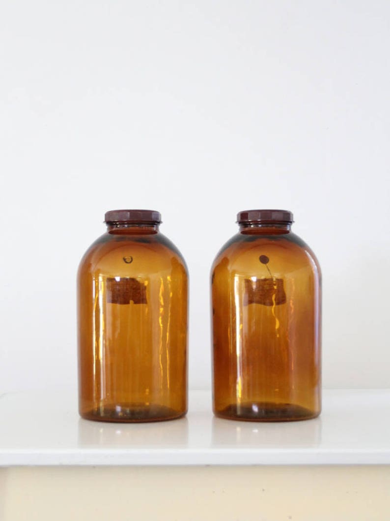 Antique pharmacy bottles large amber glass apothecary jars Etsy