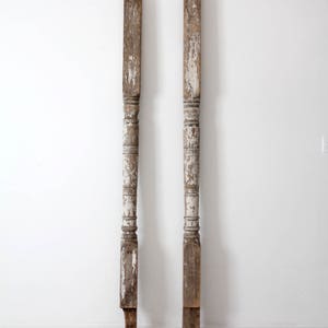 antique architectural columns, white turned wood posts