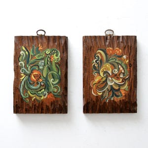 mid-century painted wood wall art pair