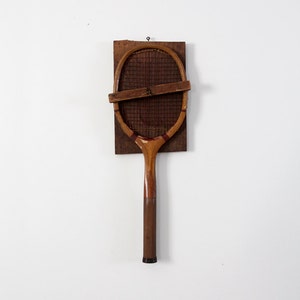 1920s W & D Criterion tennis racquet with primitive wall mount