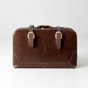 vintage brown leather suitcase