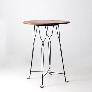 antique wrought iron and wood tall bistro table
