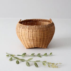 vintage small handwoven basket