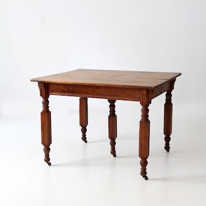 antique five leg dining table