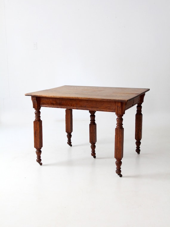 antique dining table with crank