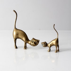 mid-century brass cats pair