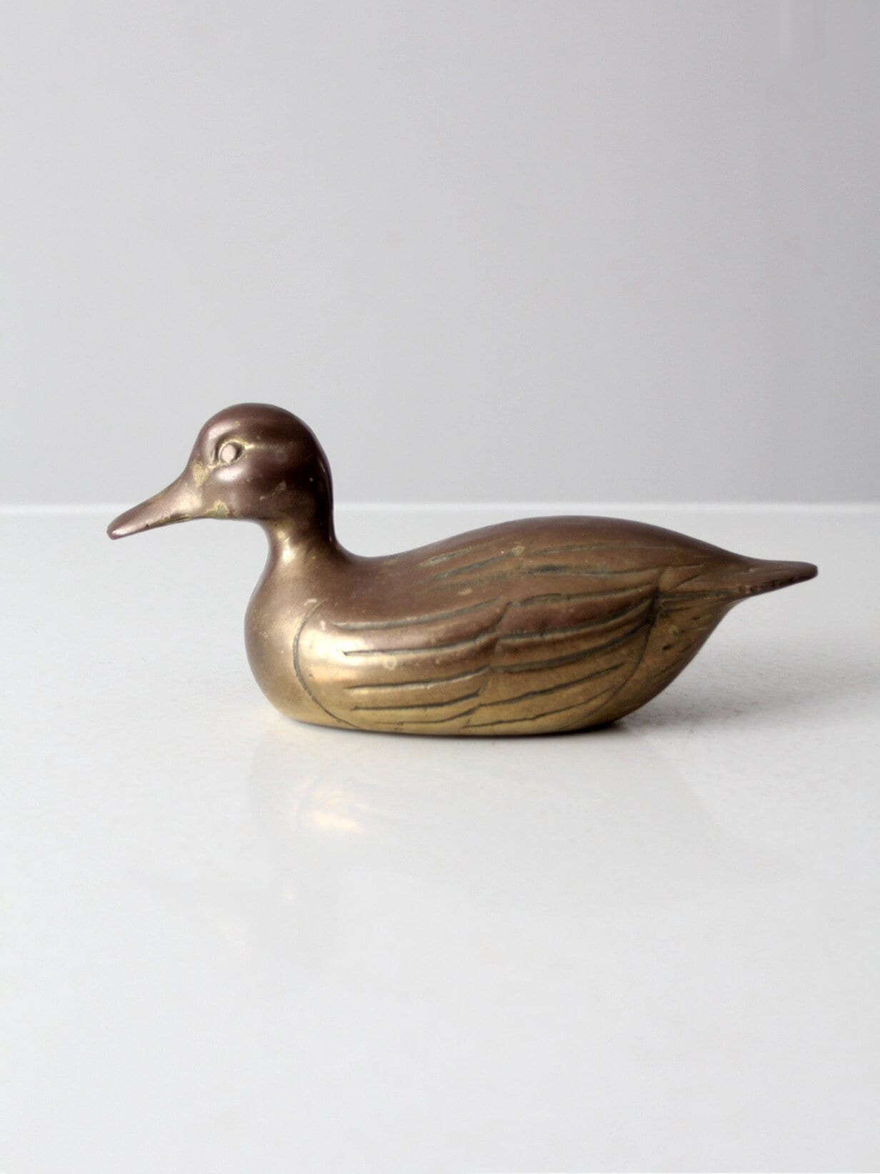 mid-century brass duck