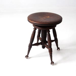 antique claw and ball foot piano stool