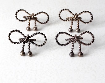 vintage silver bow napkin rings set