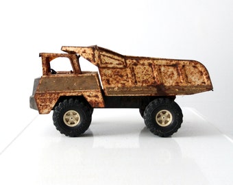 vintage Nylint dump truck, distressed toy truck