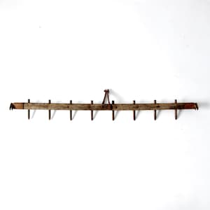 antique spike tooth harrow, primitive farm tool