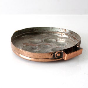 antique copper escargot or egg-poaching pan