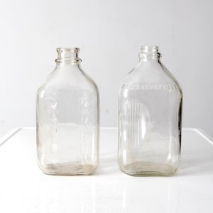 pair vintage glass milk jugs