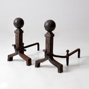 antique wrought iron andirons, cannonball fire dogs