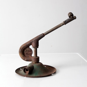 antique Rain King sprinkler