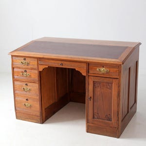 antique Victorian kneehole writing desk