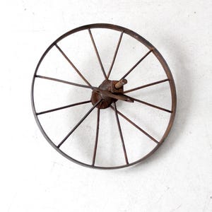 antique iron cart wheel