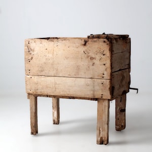 May include: A rustic wooden sign with the text "Welcome to our home" in white lettering. The sign features a distressed finish and a simple, inviting design, perfect for a front porch or entryway.