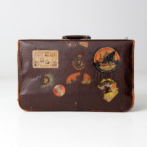 vintage 1930s leather suitcase with stickers
