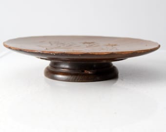 vintage wooden cake stand with carved floral design