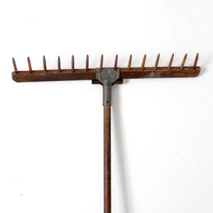 antique wooden hay rake