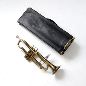 vintage C. G. Conn brass trumpet with case