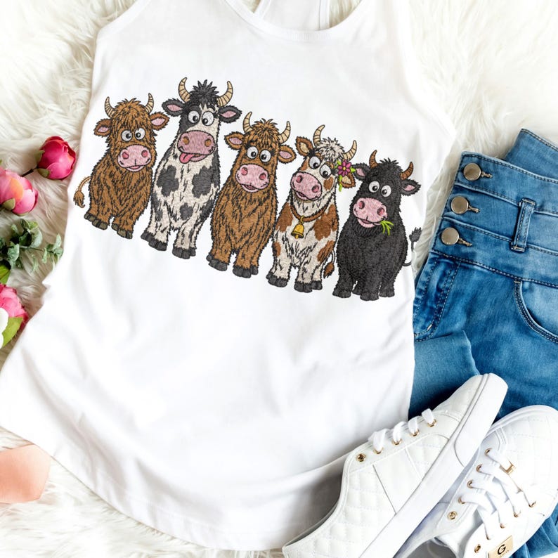 May include: A white tank top featuring a graphic print of five cartoon cows in a row. The cows include a brown shaggy cow, a black and white spotted cow with its tongue out, a light brown shaggy cow, a tan and white cow with a bell, and a black cow.
