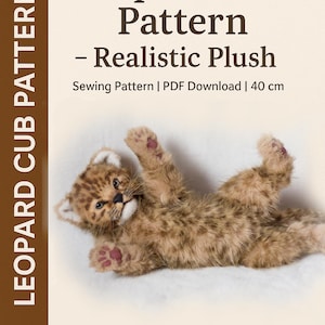 May include: A realistic plush leopard cub, approximately 40 cm long, lies on its back. The image includes text: "Leopard Cub Pattern - Realistic Plush" and "Author Olga Naumova." The sewing pattern is a PDF download.