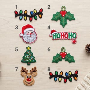 May include: A collection of eight embroidered Christmas-themed patches labeled one through eight, featuring designs of colorful string lights, holly leaves with red berries, a Santa Claus face, the text HOHOHO, a tree, and a reindeer.