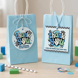 May include: Two light blue gift bags with white handles. Each bag has a tag that says "thank you" in a retro font. One tag says "For coming to my party" and the other says "I had so much fun with you."