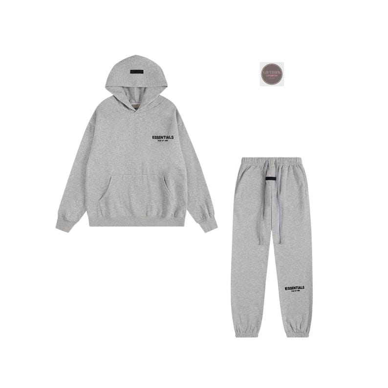 May include: A gray hoodie and matching sweatpants set. The hoodie has a front pocket and the word "ESSENTIALS" printed on the chest. The sweatpants have a drawstring waist and the word "ESSENTIALS" printed on the lower left leg.