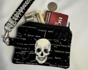 Cartera para identificación con diseño de esqueleto que brilla en la oscuridad, monedero para tarjetas y pulsera.