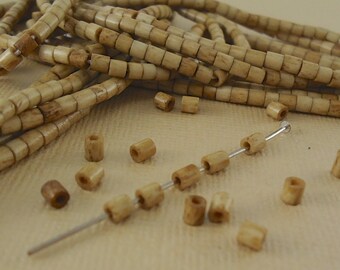 18 strand of Tea Dyed Heishi Bone Beads 3x5mm Antiqued bone beads. Carabao bone beads hand-made in the Philippines