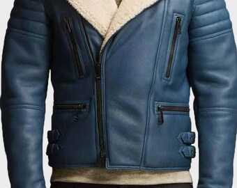 May include: A blue leather jacket with a cream-colored shearling collar and lining. The jacket features a zip-up front, multiple pockets, and decorative stitching on the shoulders. The jacket has a classic biker style.