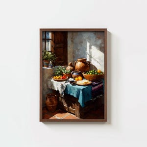 May include: A framed still life painting depicts a table set with a blue tablecloth, bowls of fruit, and pottery. Sunlight streams in from a window, illuminating the scene. The artwork features warm tones and a rustic aesthetic, evoking a sense of a Mediterranean setting.