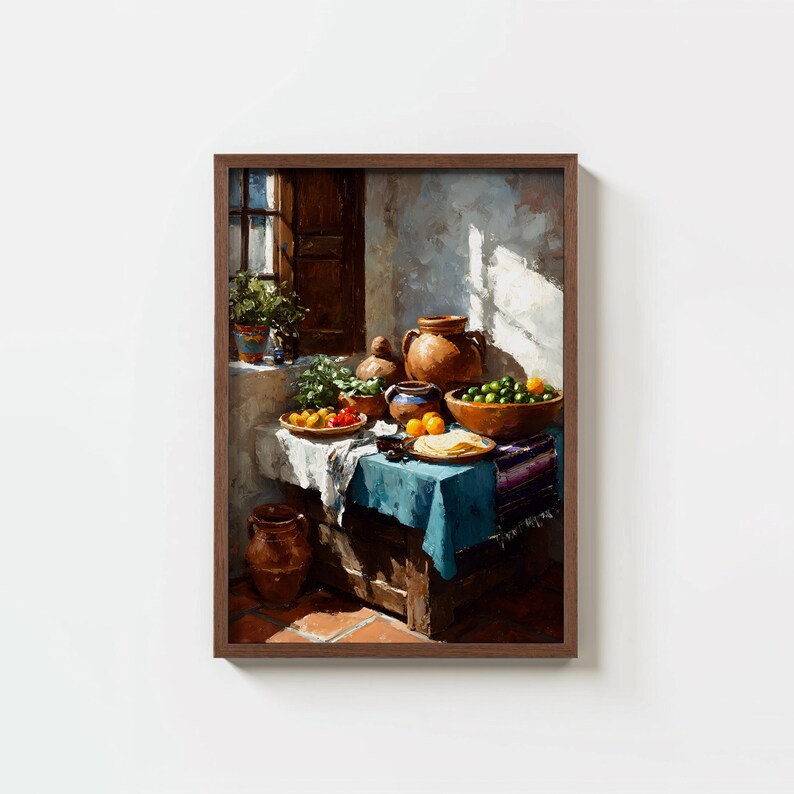 May include: A framed still life painting depicts a table set with a blue tablecloth, bowls of fruit, and pottery. Sunlight streams in from a window, illuminating the scene. The artwork features warm tones and a rustic aesthetic, evoking a sense of a Mediterranean setting.