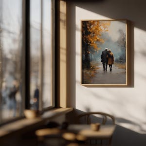 May include: A framed art print depicts an elderly couple walking on a path. The artwork features a muted color palette with shades of brown, orange, and gray, suggesting an autumn scene. The couple is seen from behind, adding a sense of intimacy.