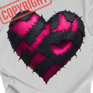 May include: White t-shirt featuring a large, stitched heart design. The heart is composed of black and pink patches, with visible stitching. The word "COPYRIGHT" is stamped in red across the top of the shirt.