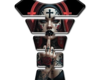 May include: A motorcycle tank pad featuring a gothic woman with black lipstick, cross tattoos, and a red rose tattoo. The woman is holding up her middle finger. The tank pad is black with red accents.