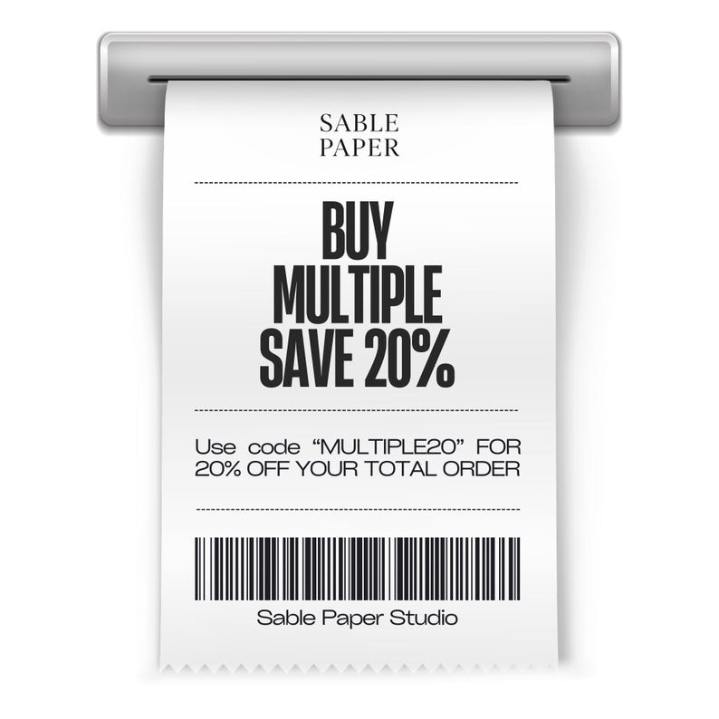 May include: A receipt from Sable Paper Studio, printed from a silver machine. The receipt reads "BUY MULTIPLE SAVE 20%" with the text "Use code 'MULTIPLE20' for 20% off your total order."