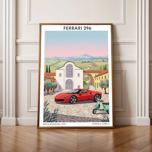 May include: Framed art print featuring a red Ferrari 296 sports car parked in front of a white building with a scenic Italian landscape backdrop. The print includes the text "FERRARI 296" and location details.