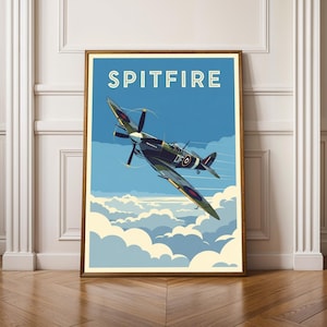 May include: A framed print featuring a vintage illustration of a Spitfire airplane in flight. The artwork showcases the aircraft against a blue sky with stylized clouds. The word "SPITFIRE" is displayed at the top in white letters.