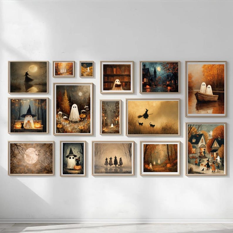 May include: A collection of framed Halloween-themed art prints. The artwork features various scenes with ghosts, witches, and full moons. The color palette includes shades of orange, brown, and black, creating a spooky and atmospheric feel. The prints are displayed on a white wall.