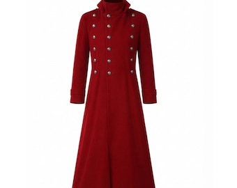 May include: A long, deep red coat featuring a high collar and a double-breasted front closure. The garment is adorned with two vertical rows of metallic silver buttons, long sleeves with cuffs, and a central front slit extending from the waist down.